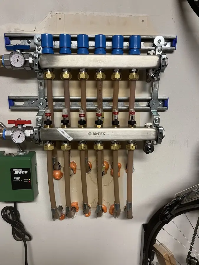 Plumber performing Gas Line Installation at a residential property in Camden